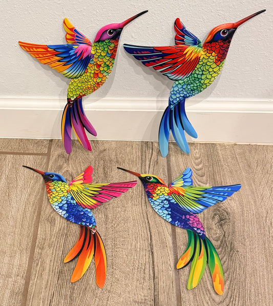 Four colorful metal hummingbird wall decorations