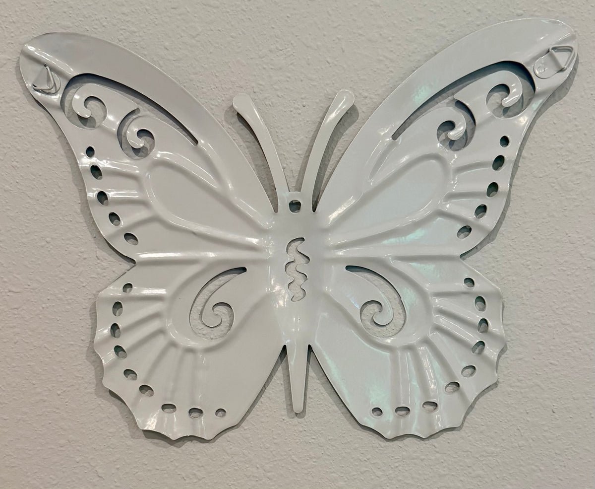 Hardware to hang on wall or fence.